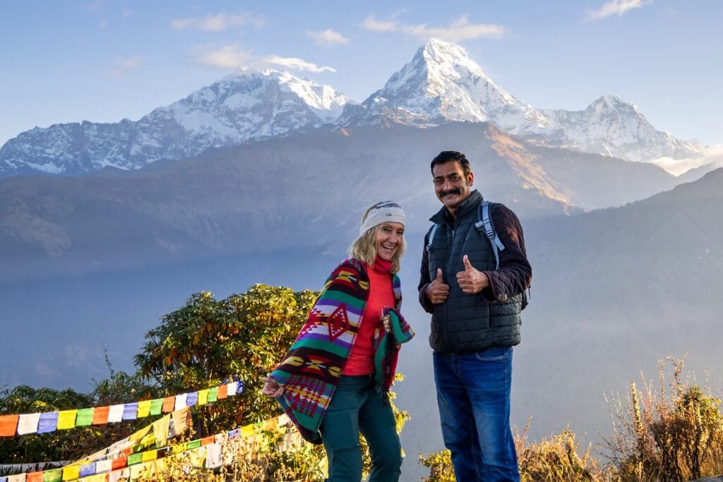 Scenic Annapurna Himalayas view with Kapil and a guest during the trek