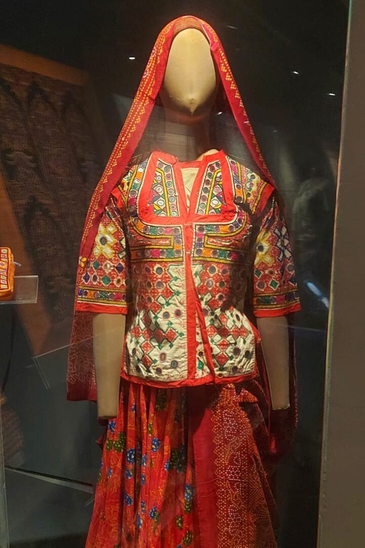 Traditional Indian textiles displayed in a museum exhibition