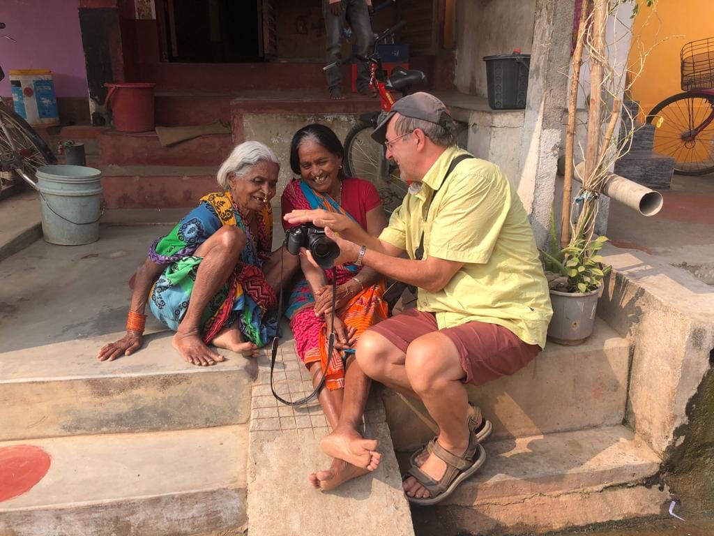 Travellers with locals in India