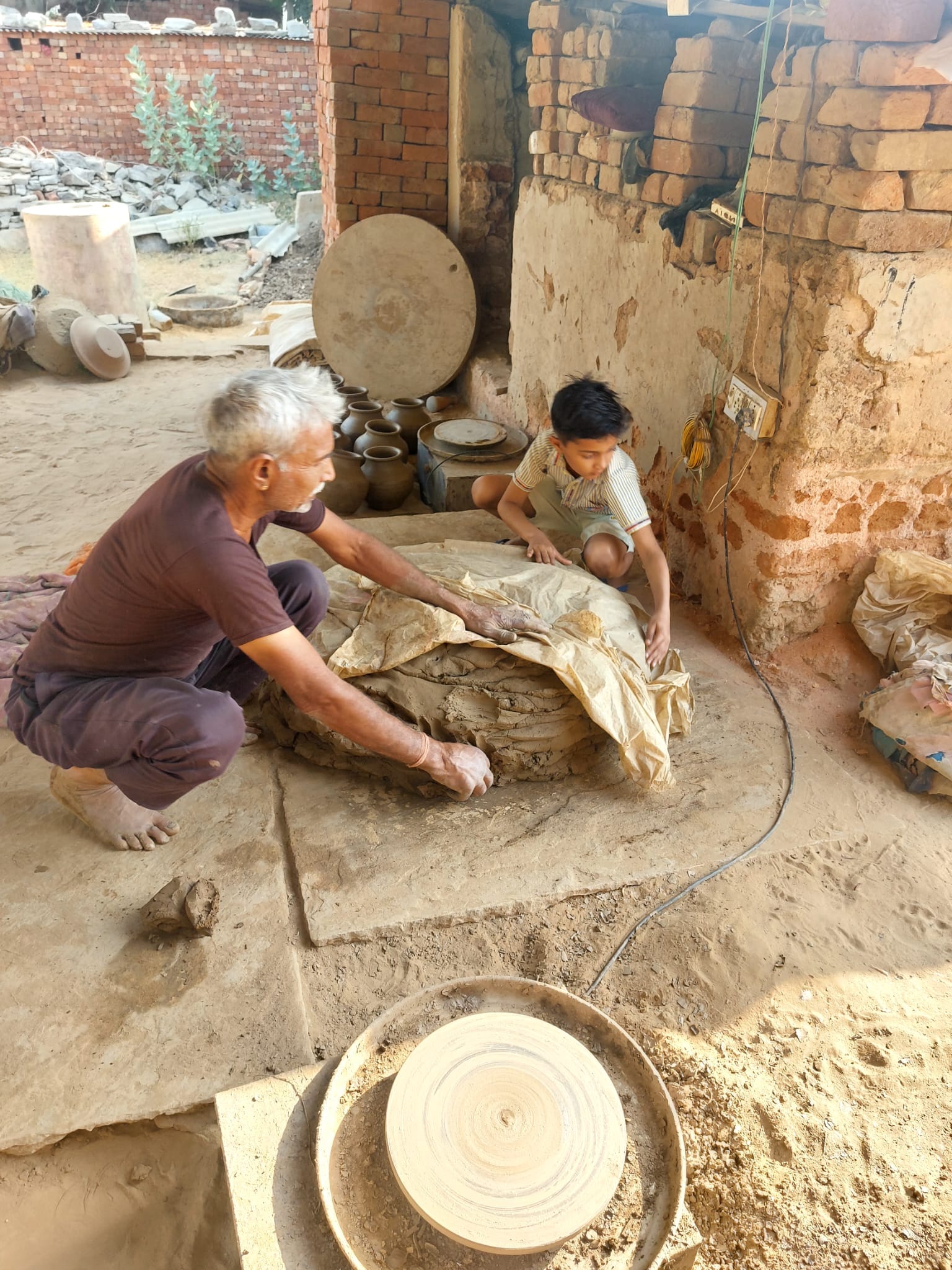 At the potter’s wheel