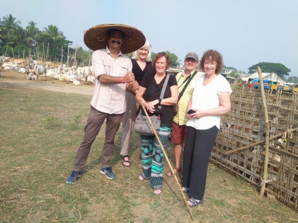 Kapil with a small group of travellers on tour